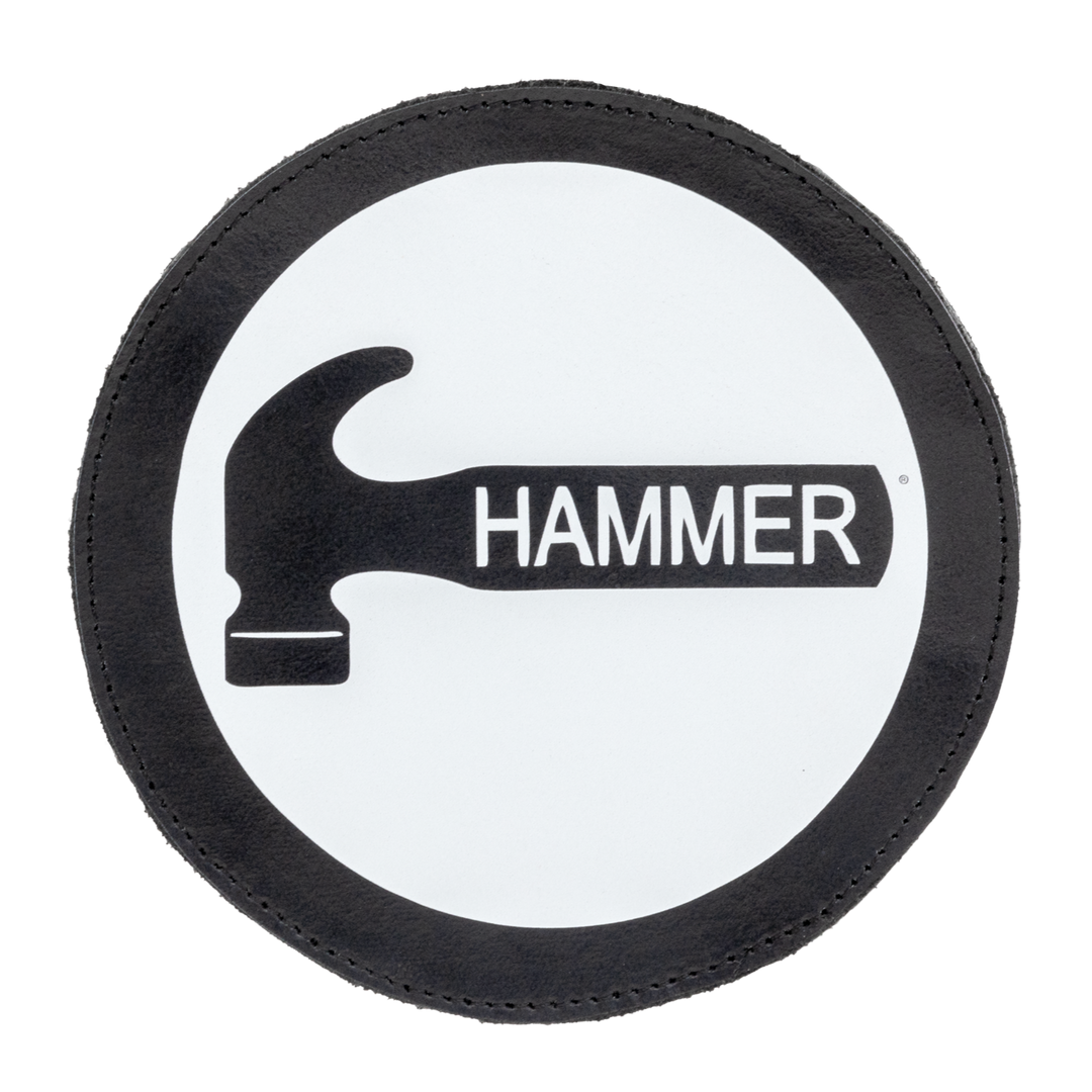 A round white and black shammy pad with the Hammer logo printed in black and large in the center.