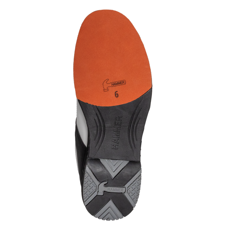 A straight-on view looking up at the bottom or sole of the white, black, and purple Destiny left shoe with the word Hammer carved out in the middle of the shoe, or the bridge, with another small Hammer logo along with the number six in the orange sole pad and another Hammer logo molded in the heel.