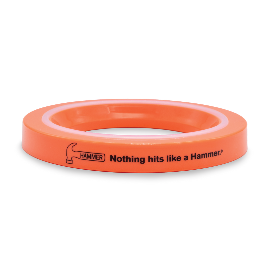 An orange "Easy Glide" ball cup with a white teflon strip on the top and the Hammer logo and tagline printed on the edge in black.