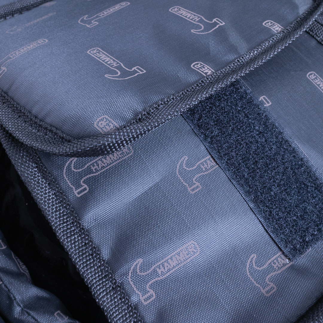 Hammer Gantlet Triple Roller Grey interior close up of lining printed with Hamnmner logos.