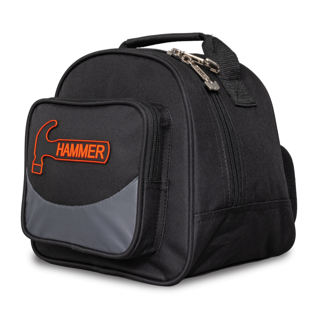 A black and grey single bowling ball bag with a 'Hammer' logo on the front pocket and adjustable rear strap three-quarter view facing left.