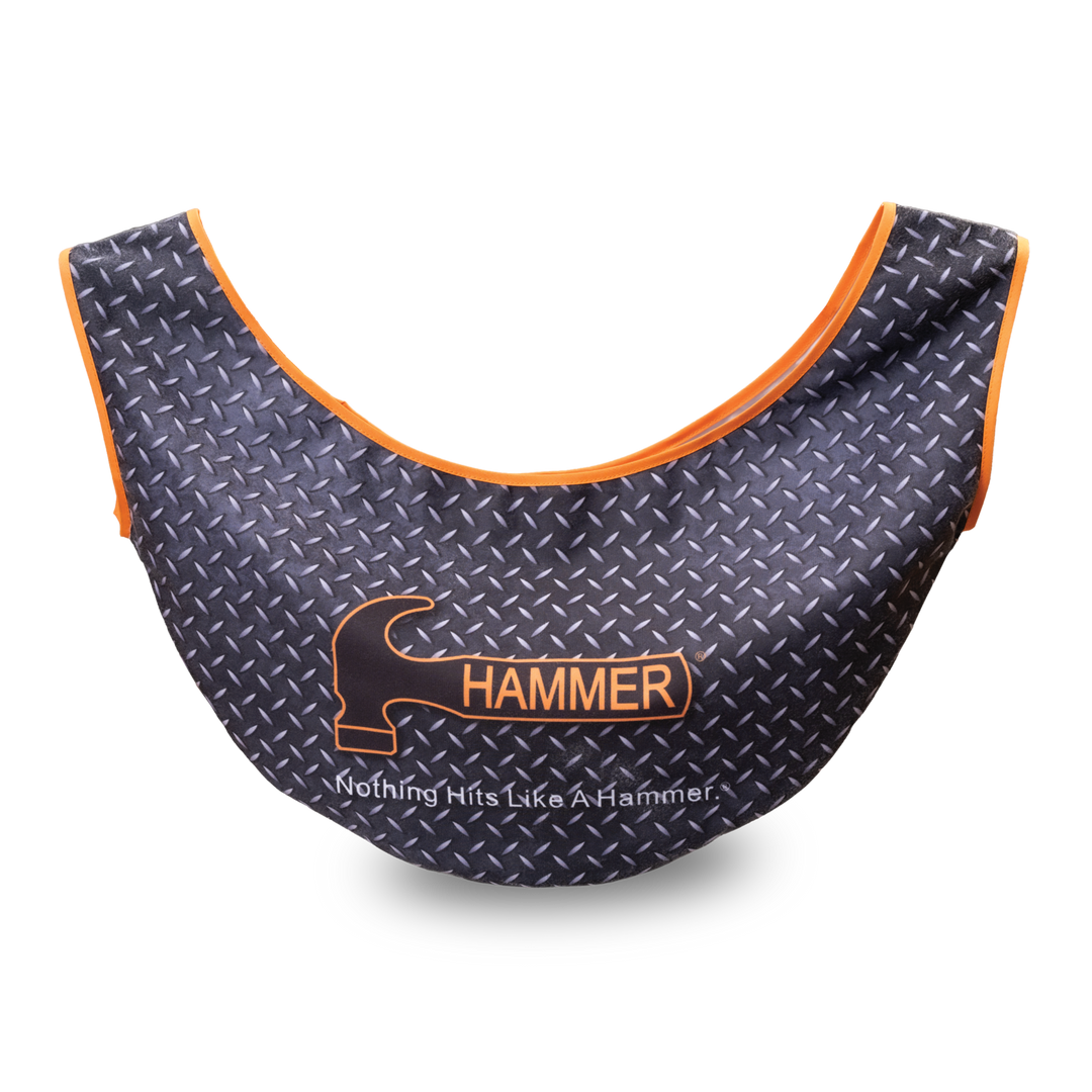 A See-Saw ball carrier in a black and grey diamond plate pattern with orange piping around the edges and the Hammer logo printed on the front.