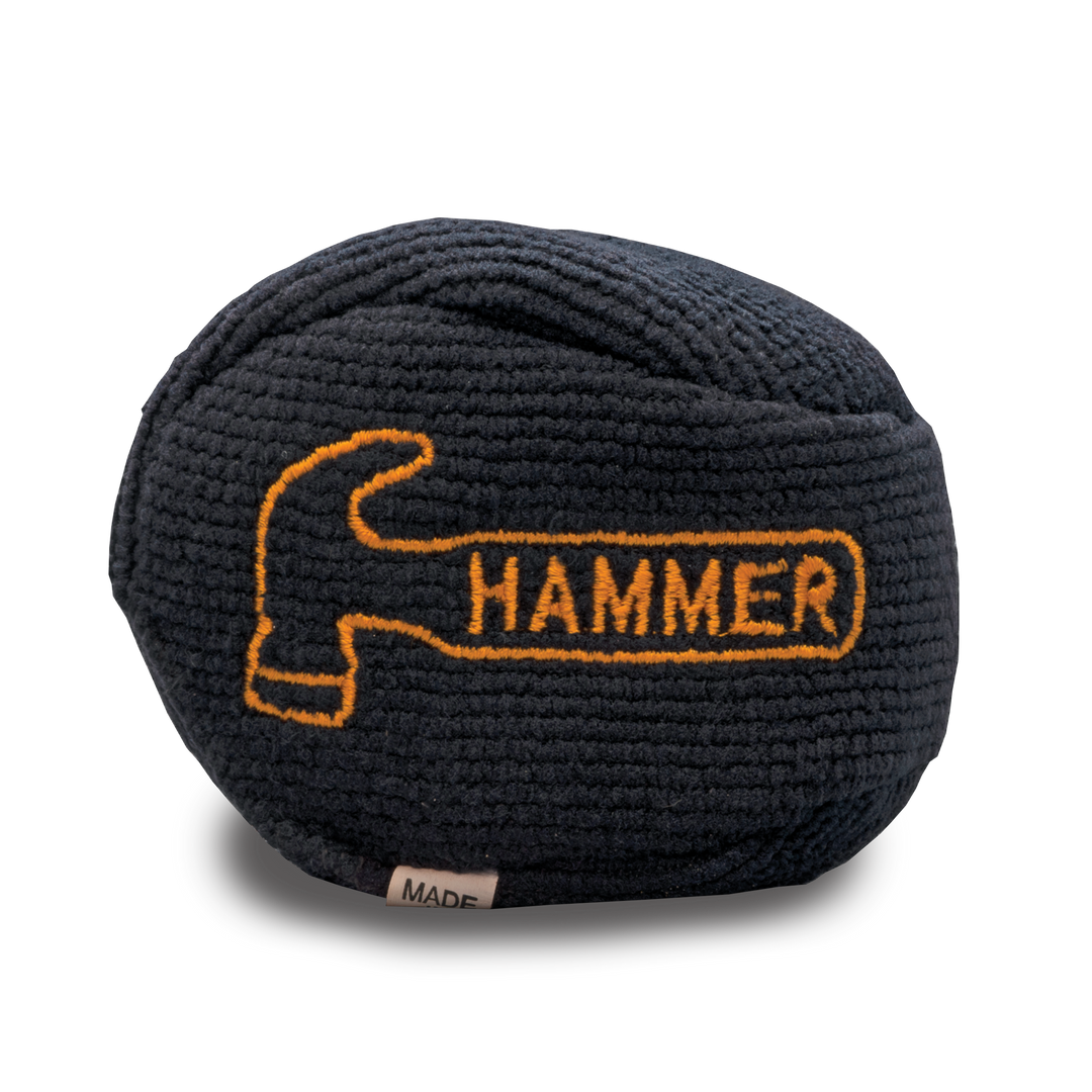 A black grip ball with the Hammer logo embroidered on the front in orange.