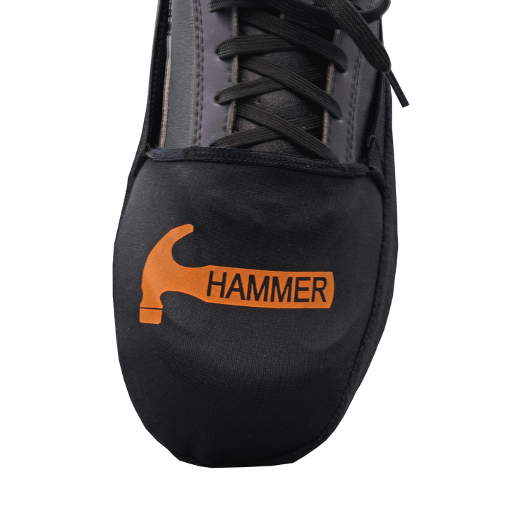 A top-down view of the black Shoe Slider showing an orange Hammer Logo printed across the toe section.