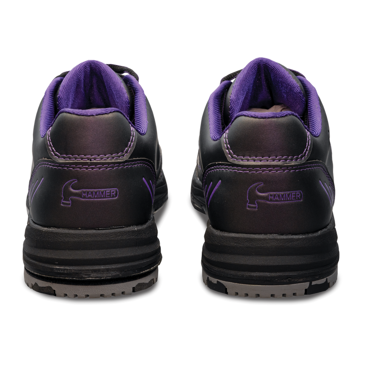 The purple and black Vicious shoes straight-on view of the backs with the Hammer logo in purple.