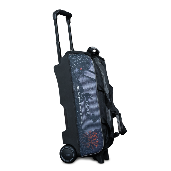 The Hammer Black Widow Hybrid Triple Roller in the upright position with the handle extended and Black Widow graphics printed on the side panel.