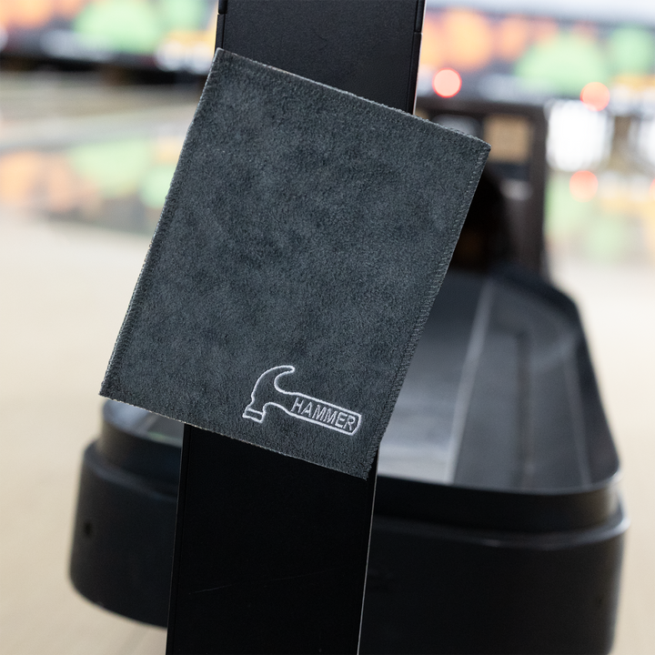 The Hammer Magnetic Shammy stuck onto the shaft of a scoring console.