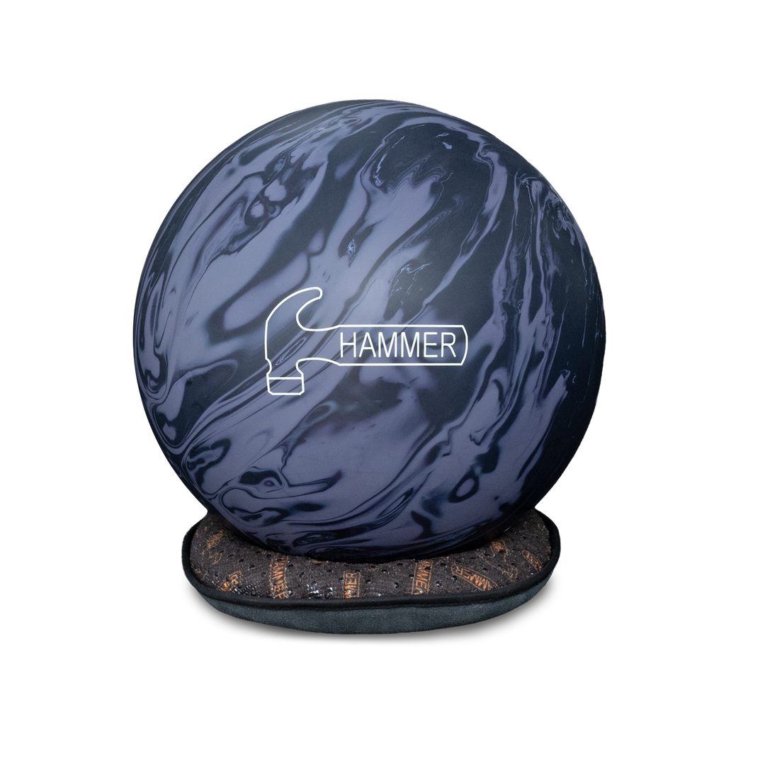 The Hammer Pillow Shammy sitting flat with a bowling ball resting on top in the middle of the shammy.