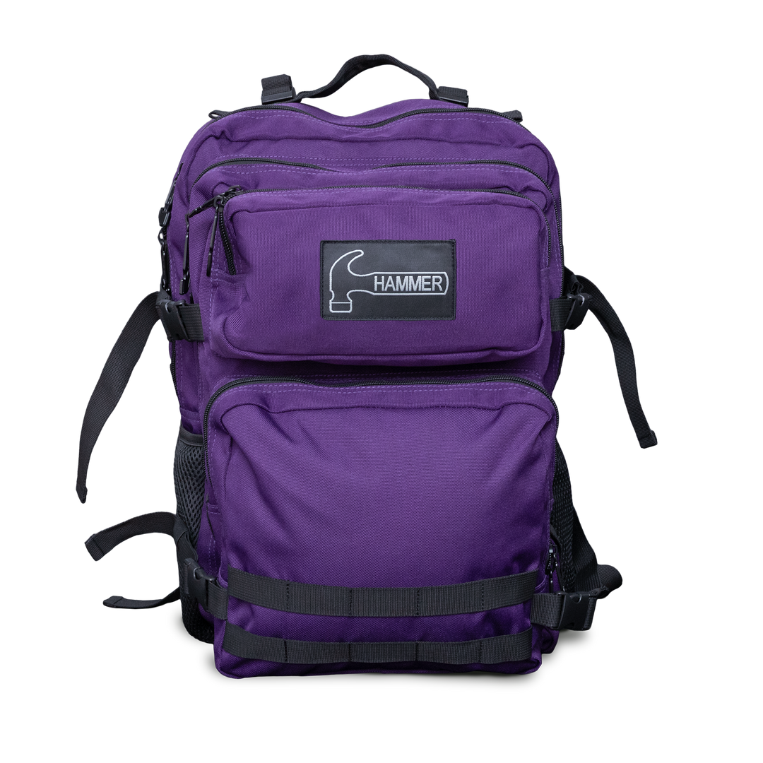 A purple backpack with black straps and the Hammer logo in white looking at the front side straight on view.