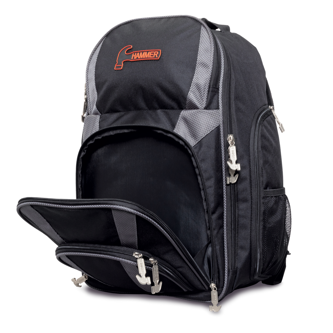 Tournament Backpack three quarter front view facing left with front pocket open.